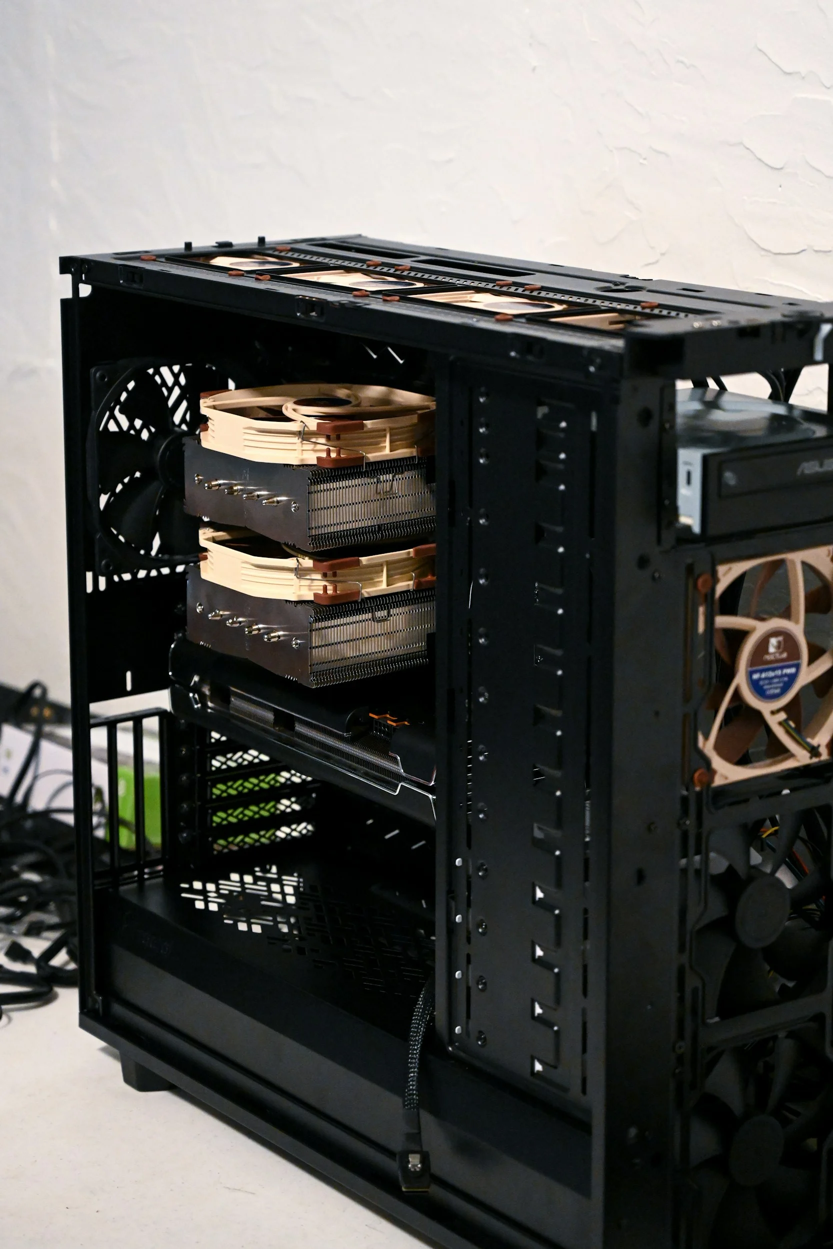 Purple-lit PC case interior showing office hardware ready for deployment